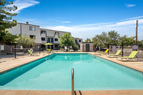 Large Swimming Pool with Lounge Chairs